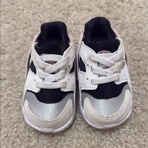 Stylish Nike Kids Sneakers in Black, White, and Pink